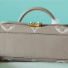 Louis Vuitton Madeleine BB Monogram Empreinte Dove Gray/ Creme Beige For Women, Women's Handbags, Shoulder and Crossbody Bags 9.4in/24cm LV